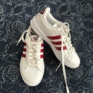 Size 9 women’s adidas shoes withh maroon stripe